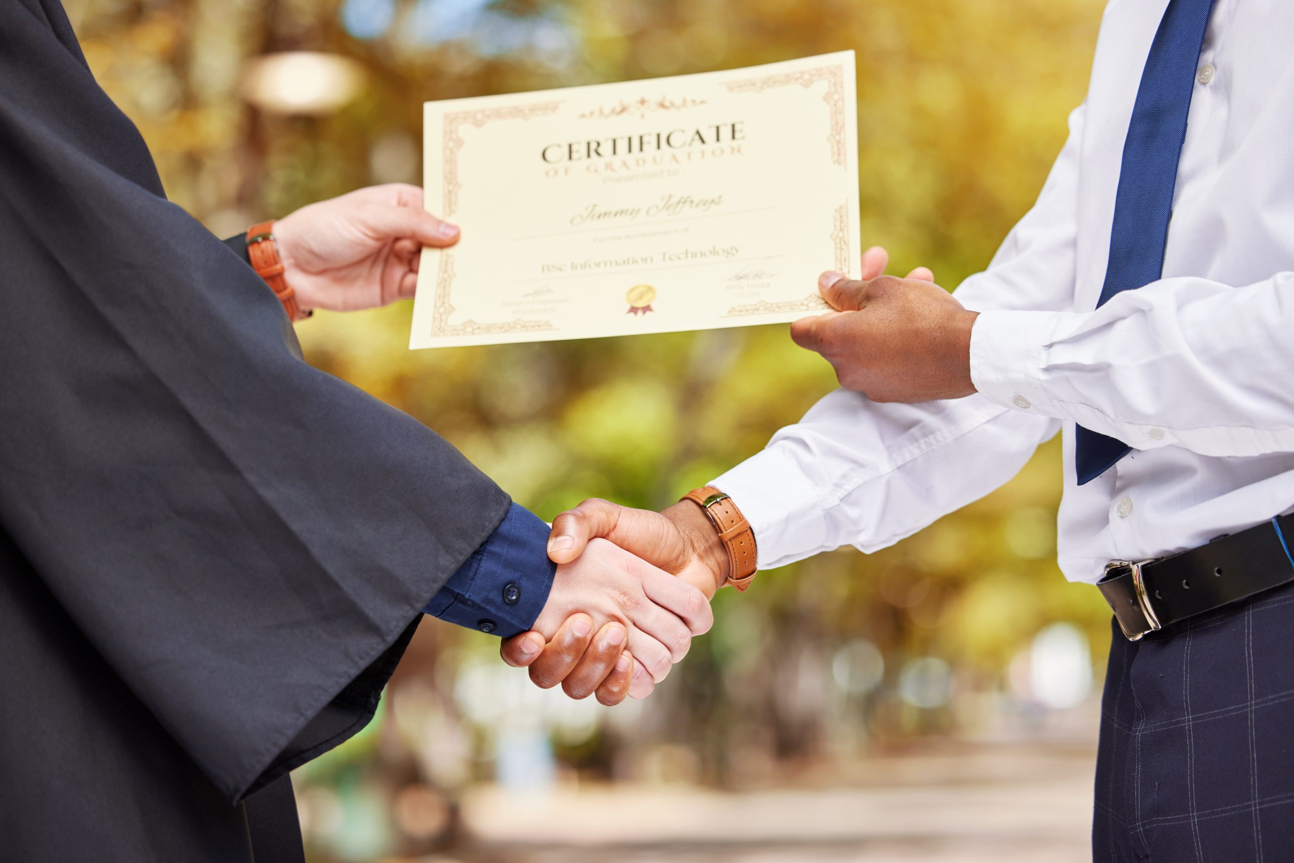 Hand shake, graduation and certificate for college student with professor, congratulations and even.